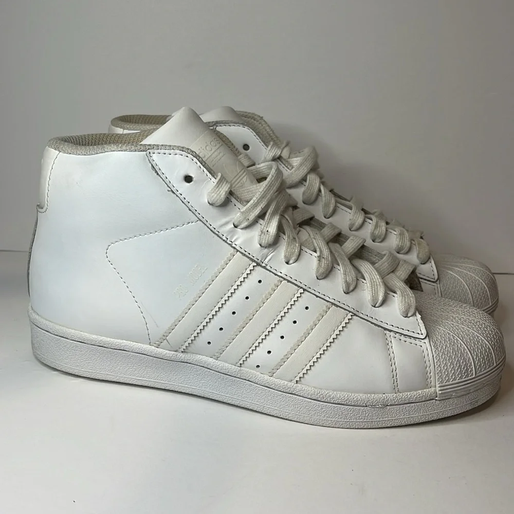 - Adidas White Pro Model High Top Sneakers